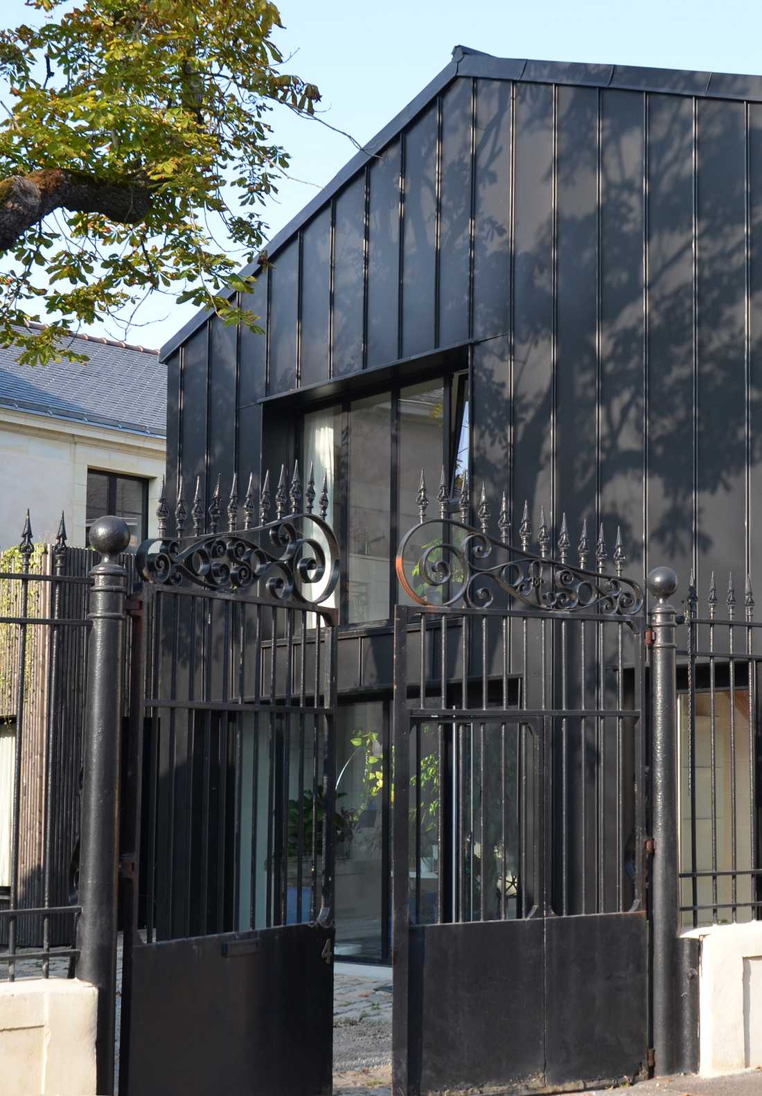 Extension contemporaine d'une maison ancienne conçue par un architecte dans le Nord