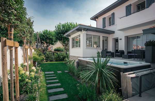 Landscaping around a villa with a swimming pool