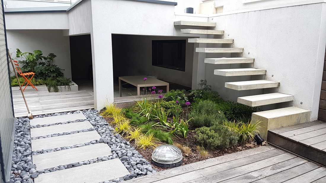 Jardin contemporain aménagé par un jardinier paysagiste à Lille