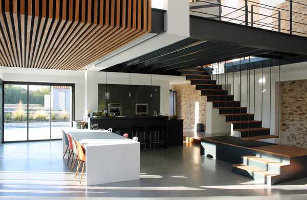 Réhabilitation d'un bâtiment agricole en habitation par un architecte d'intérieur à Lille