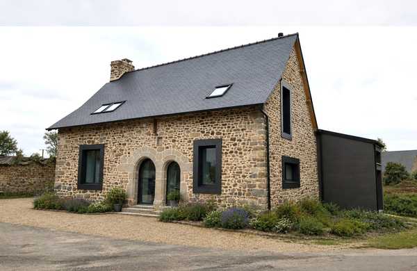 Extension d'une ancienne maison en pierre dans les Hauts-de-France