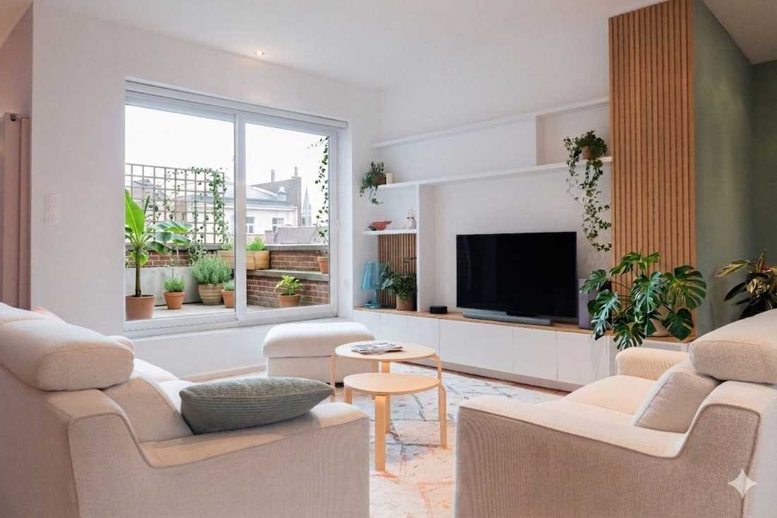 Salon de l'appartement avec banc TV sur mesure et baie vitrée